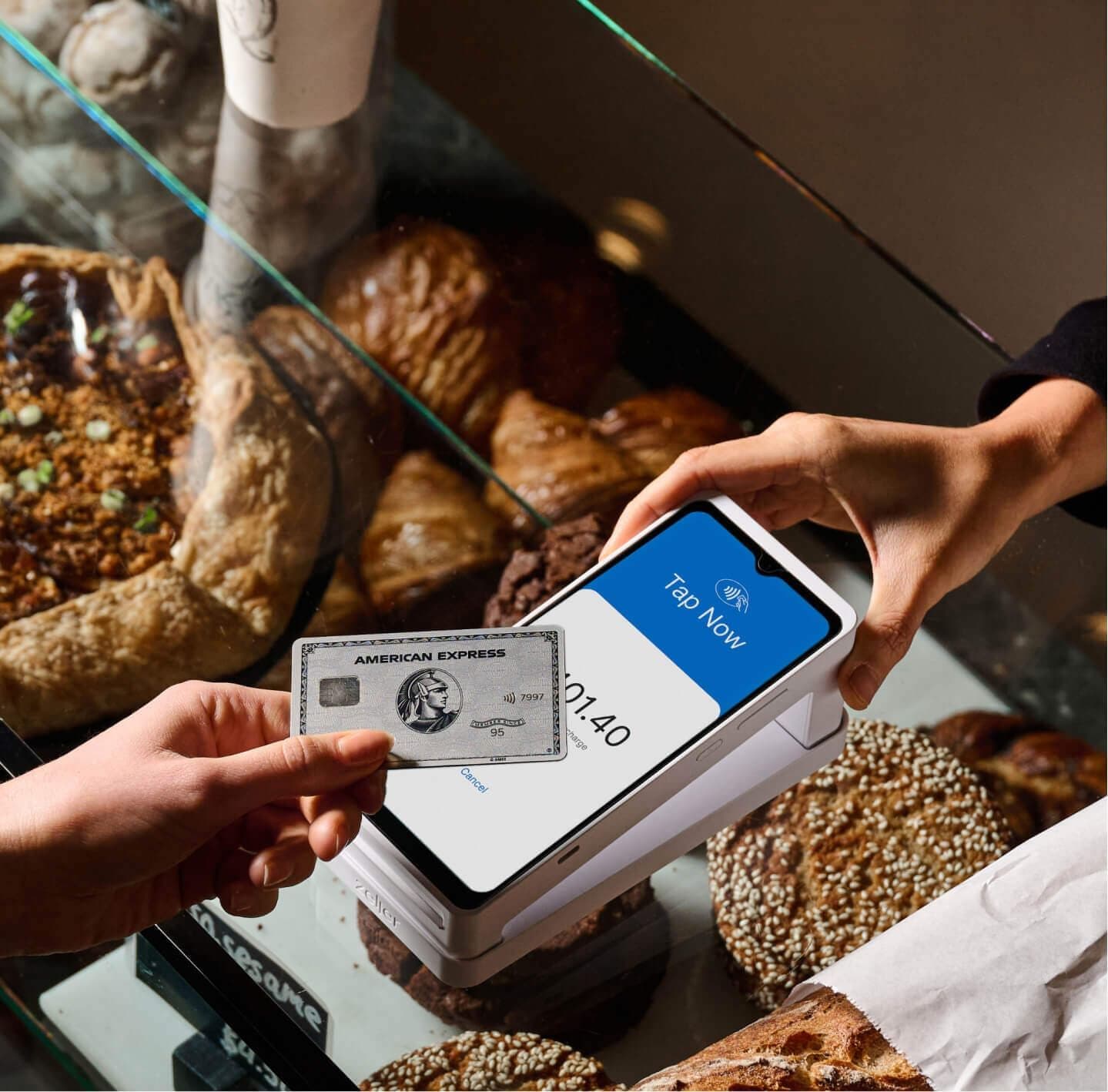 White EFTPOS machine on a bakery countertop.