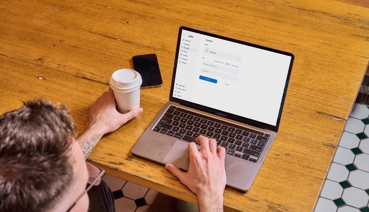 Zeller - Transfer screen, laptop, coffee