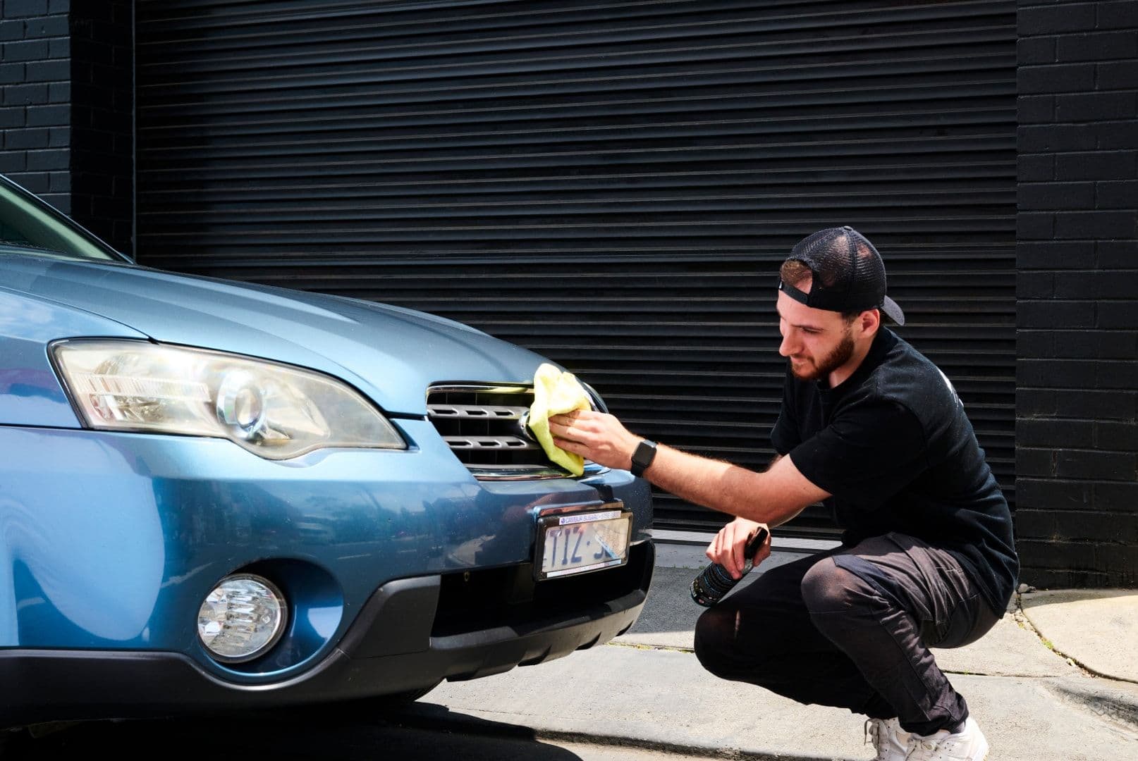 Seb's Car Wash polishing car