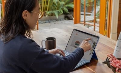 Zeller - Merchant on laptop