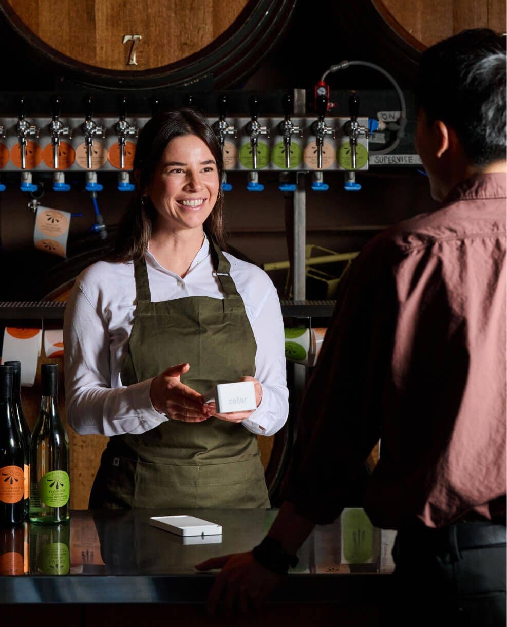 Zeller - Merchant and customer with Terminal 2 in White, wine bar